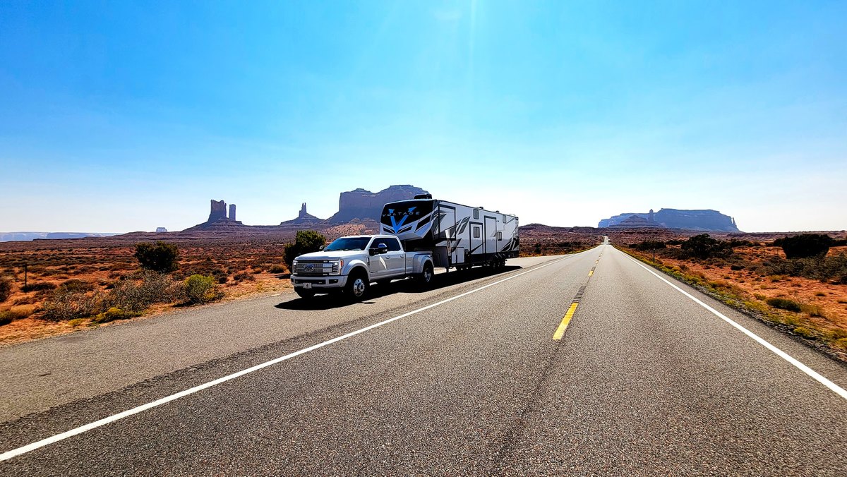 Our F-450 towing the Voltage fifth-wheel through Monument Valley